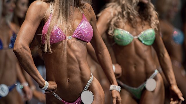 Beauty contest. Fitness bikini contest. Sexual woman's body.