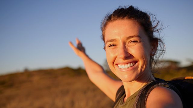 I want to share my journey with everyone. Shot of a young woman taking a selfie while out hiking.