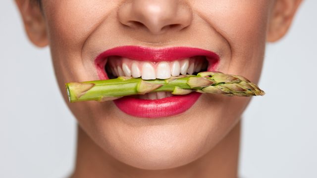 Healthy,Eating.,Closeup,Of,Woman,Mouth,With,Beautiful,Pink,Lips