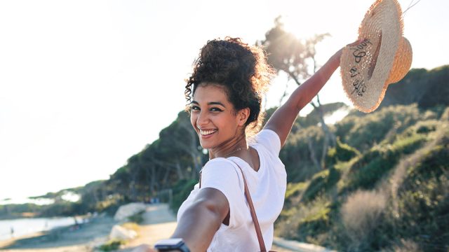 Young,Woman,Enjoying,Her,Vacation,At,The,Sea, woman,Walking