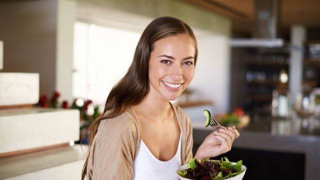 Salad, portrait and happy woman a house with breakfast, bowl or lettuce.