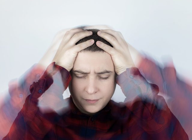 Man loses consciousness and falls down due to dizziness and disturbance of the vestibular apparatus. Severe headache and migraine. Concept of helping people suffering from migraines and dizziness