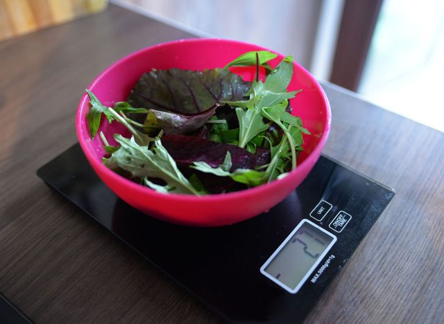 Diet concept, portion control of salad