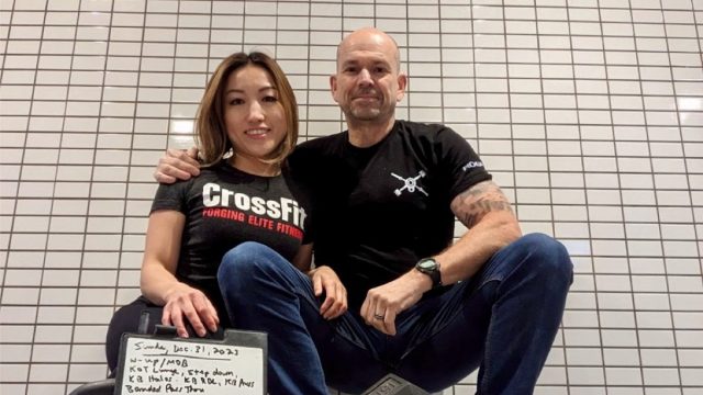 Couple posing at the gym