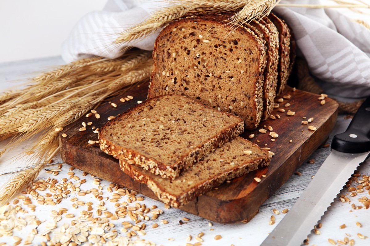 Sliced,Rye,Bread,On,Cutting,Board.,Whole,Grain,Rye,Bread