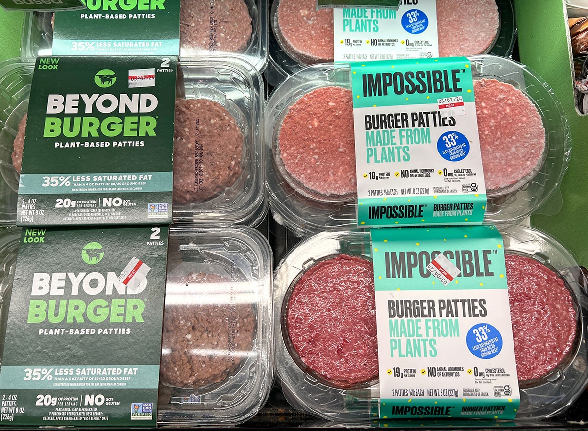 Alameda, CA - Feb 22, 2024: Grocery store refrigerator section with Beyond and Impossible Burger brand plant based patties. Plant based proteins can be as healthy as animal based proteins.