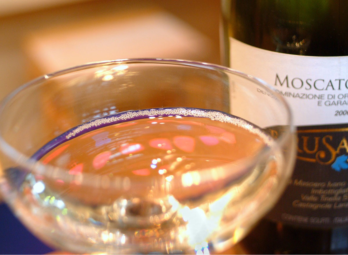 Turin, Piedmont, Italy -10-24-2009- The "Wineshow Fair". Tasting white sparkling wine Moscato d'Asti.