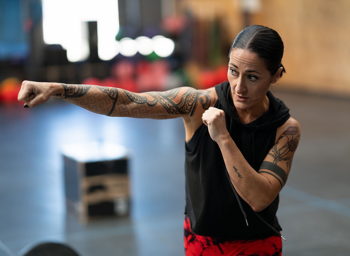 Woman shadowboxing in a cross training gym