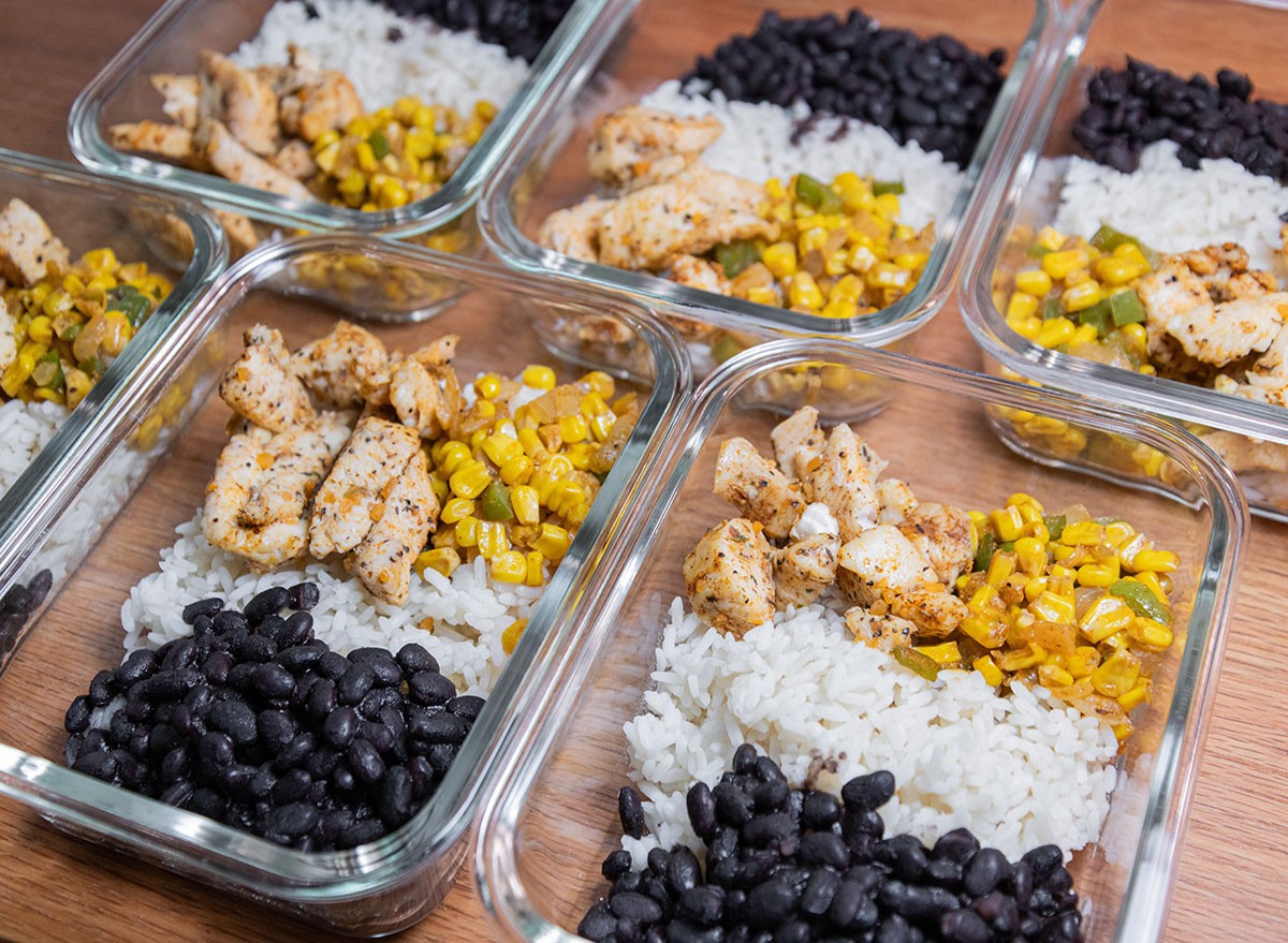 Mexican Rice Bowls Meal Prep on Wood Countertop, portion size