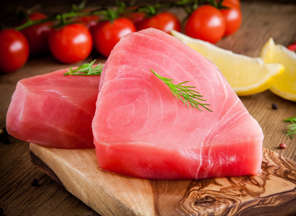 Raw,Tuna,Fillet,Dill,,Lemon,And,Cherry,Tomatoes,fish,food,protein