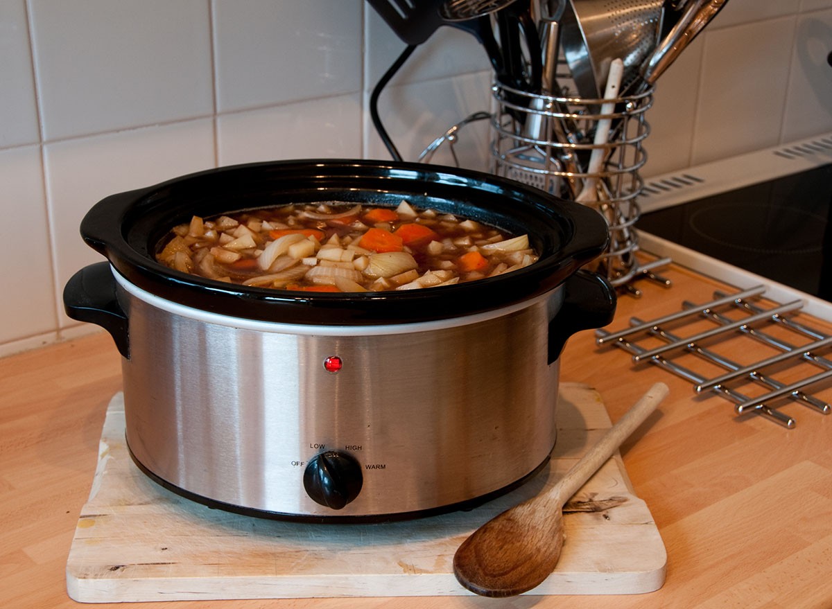 Slow cooker cooking Scouse in a Kitchen with some kitchen items in view