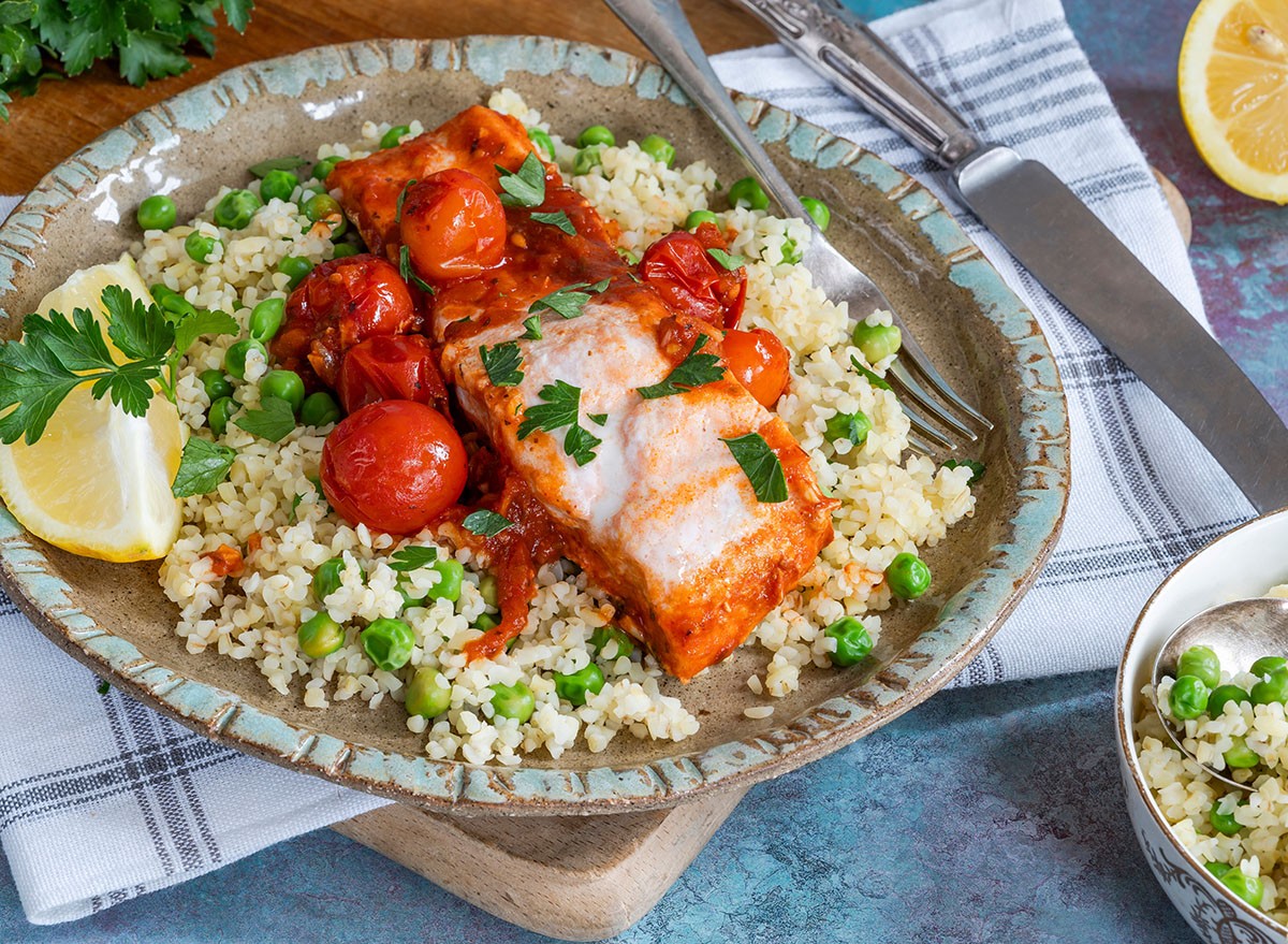 Harissa salmon with bulgur wheat, cherry tomatoes and green peas