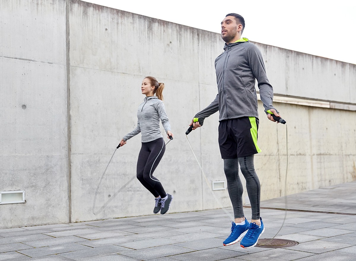 Fitness,,Sport,,People,,Exercising,skipping,jumo,rope,outdoor,workout