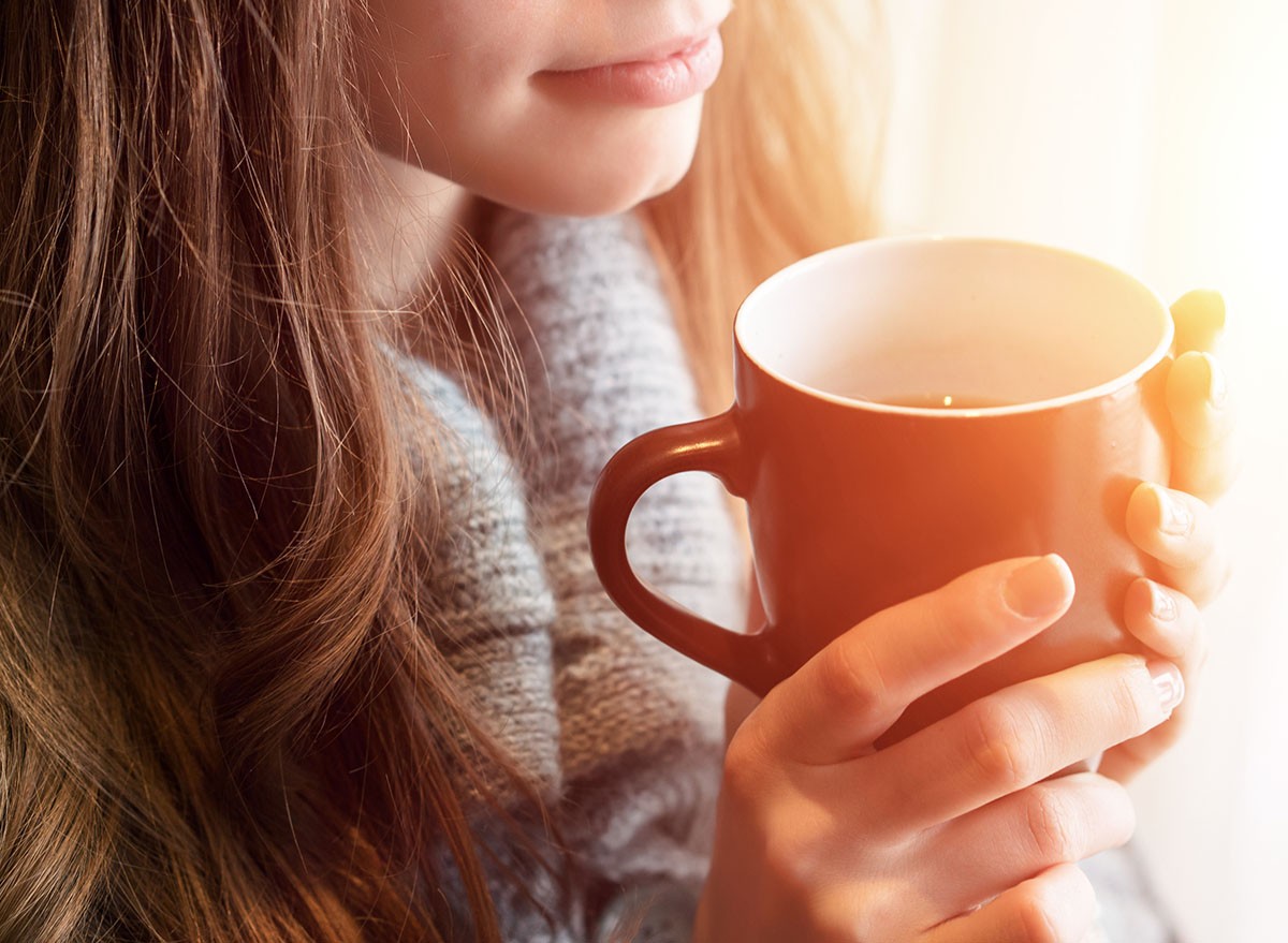 Tea time. Beautiful blonde woman holding ceramic cup of tea or coffee enjoy closeup. Looking at window and drink tea. Good morning with tea. Selective focus. Pretty young girl relaxing. Happy concept., green tean, coffee