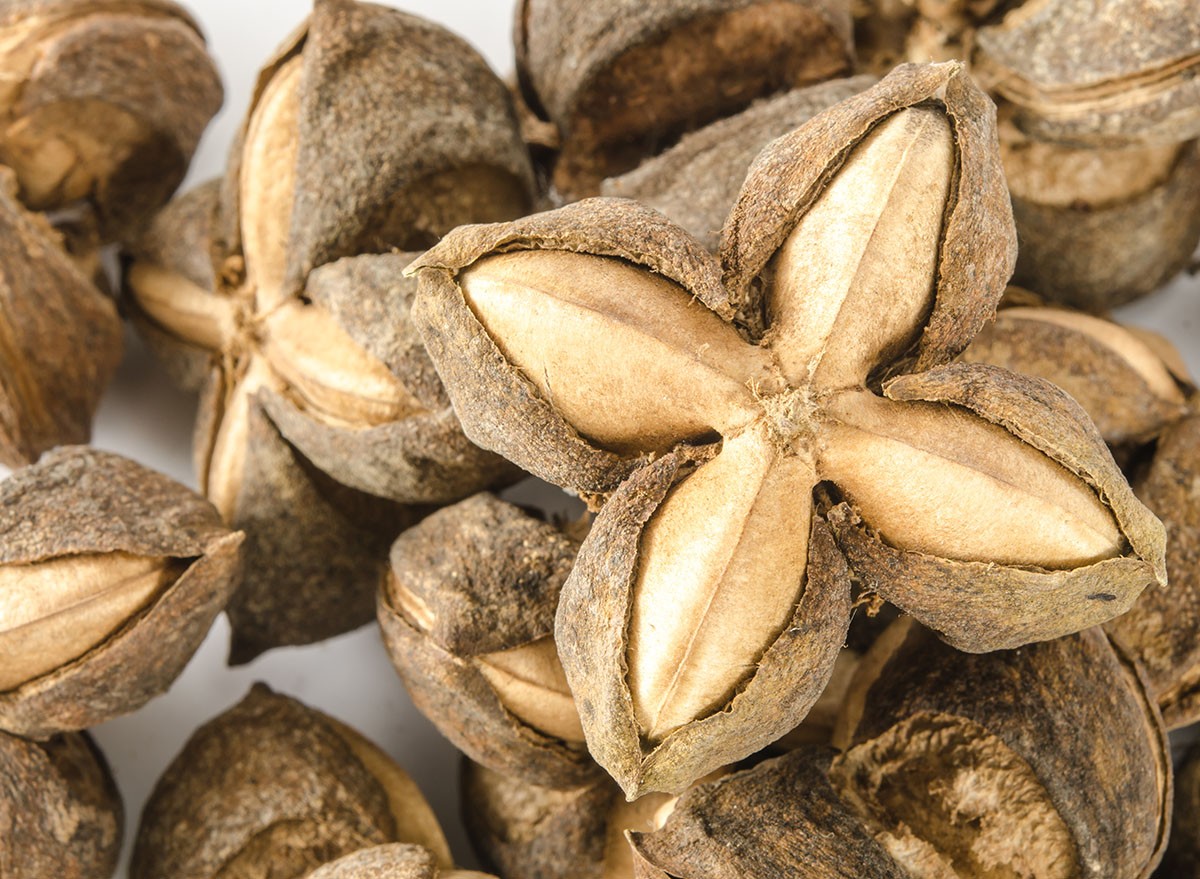 Image of sacha inchi peanut seed on white background