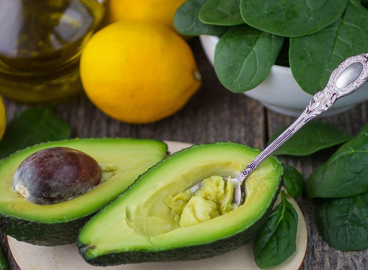 avocado, spinach and lemons. Shallow depth of field, avocados