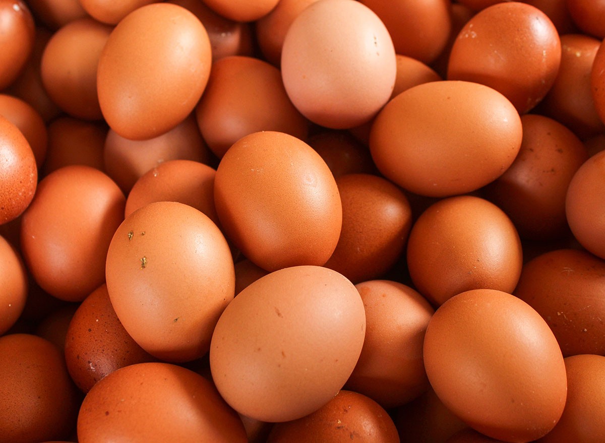 Texture and background of organic raw chicken eggs. Chicken eggs cover the frame.