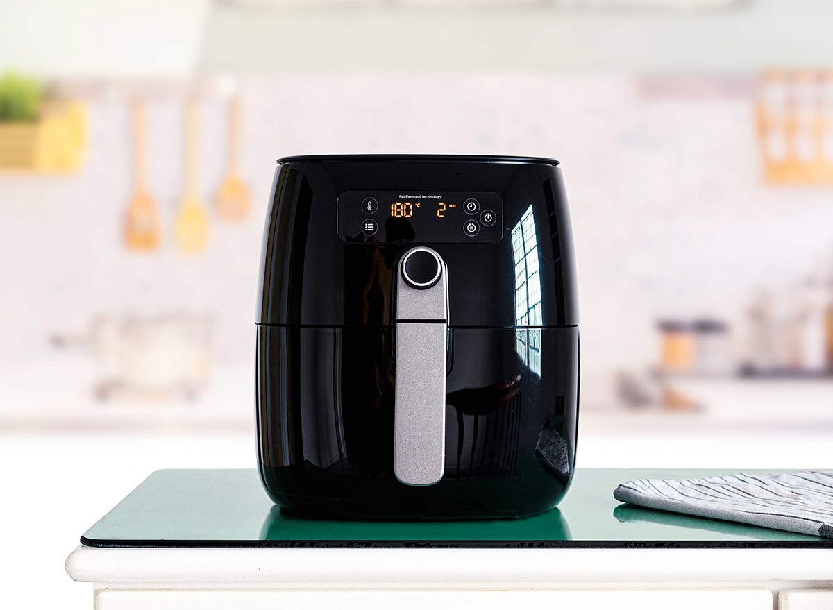 Air,Fryer,Machine,Cooking,Potato,Fried,In,Kitchen.,Lifestyle,Of