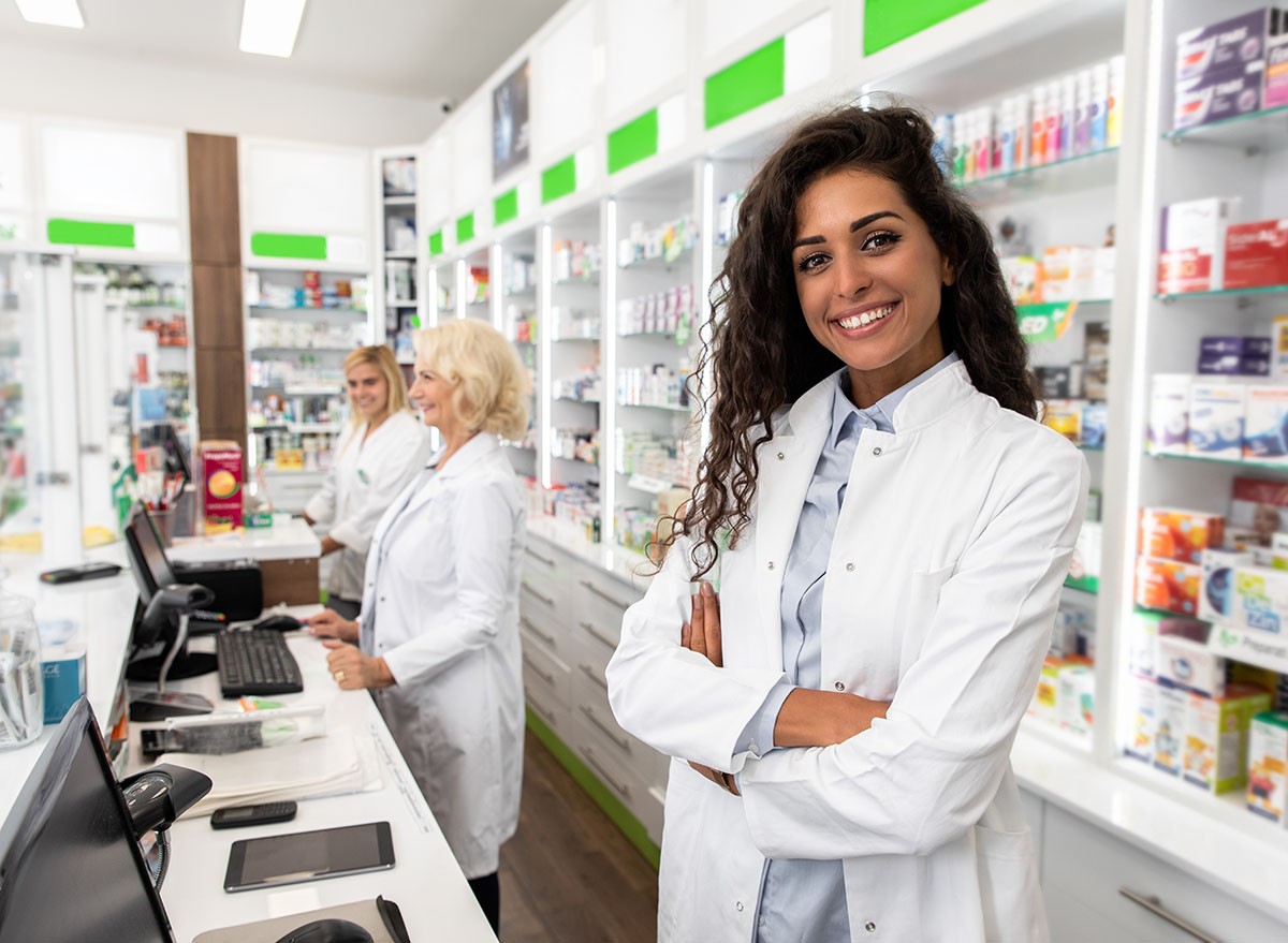 Portrait of female pharmacist in drugstore.