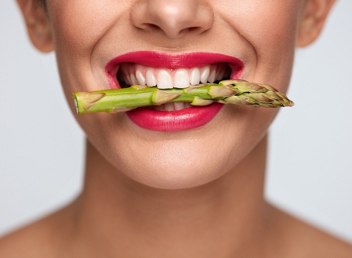 Healthy,Eating.,Closeup,Of,Woman,Mouth,With,Beautiful,Pink,Lips